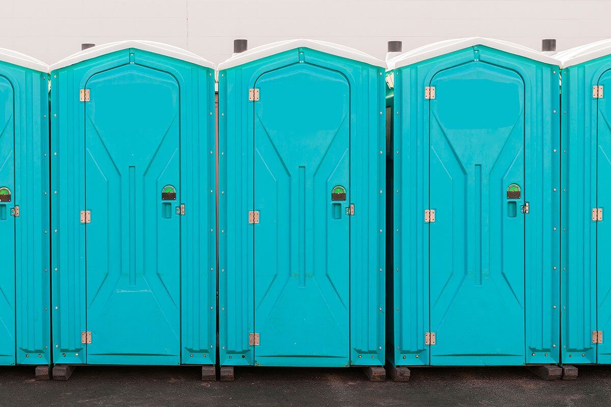 Industrial portable restroom units at a plant in Worcester, Massachusetts